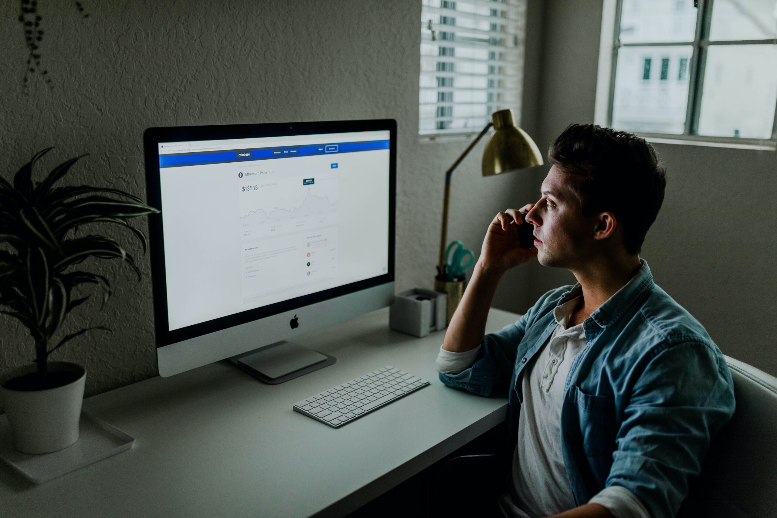 male looking at targeted keywords on monitor