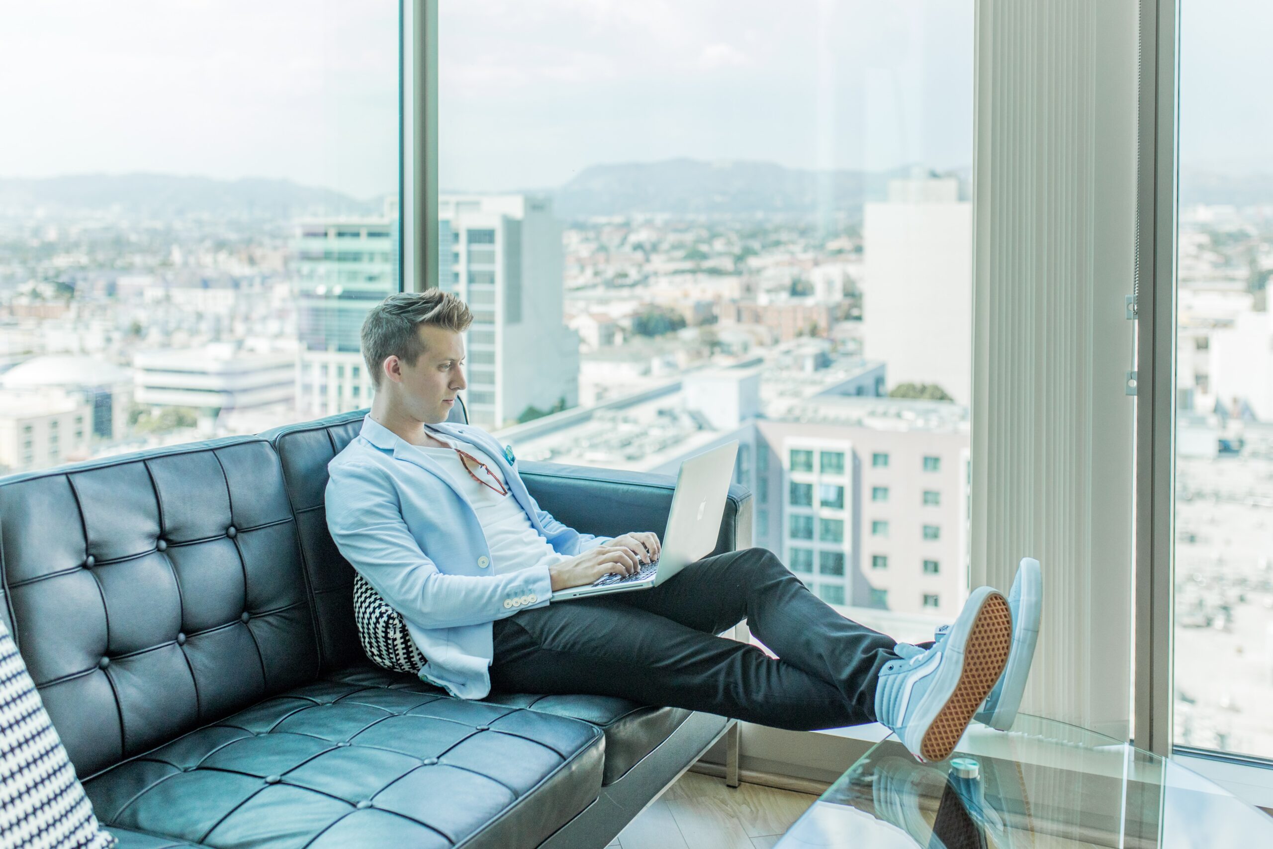 male on laptop thinking of targeted keywords